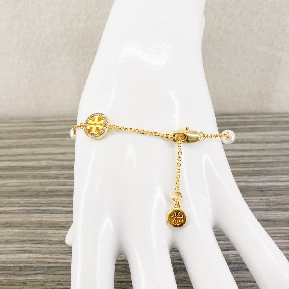 Tory Burch Crystal Logo & Imitation Pearl Station Bracelet Ivory/Tory Gold OS - Picture 13 of 16